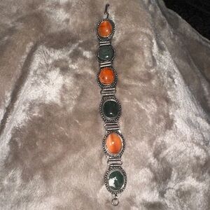 Elegant Silver Bracelet with Orange and Green Stones